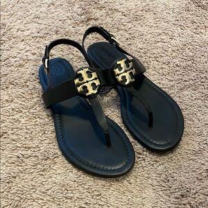 Tory Burch Black Sandals with Thong Design and Gold Emblem